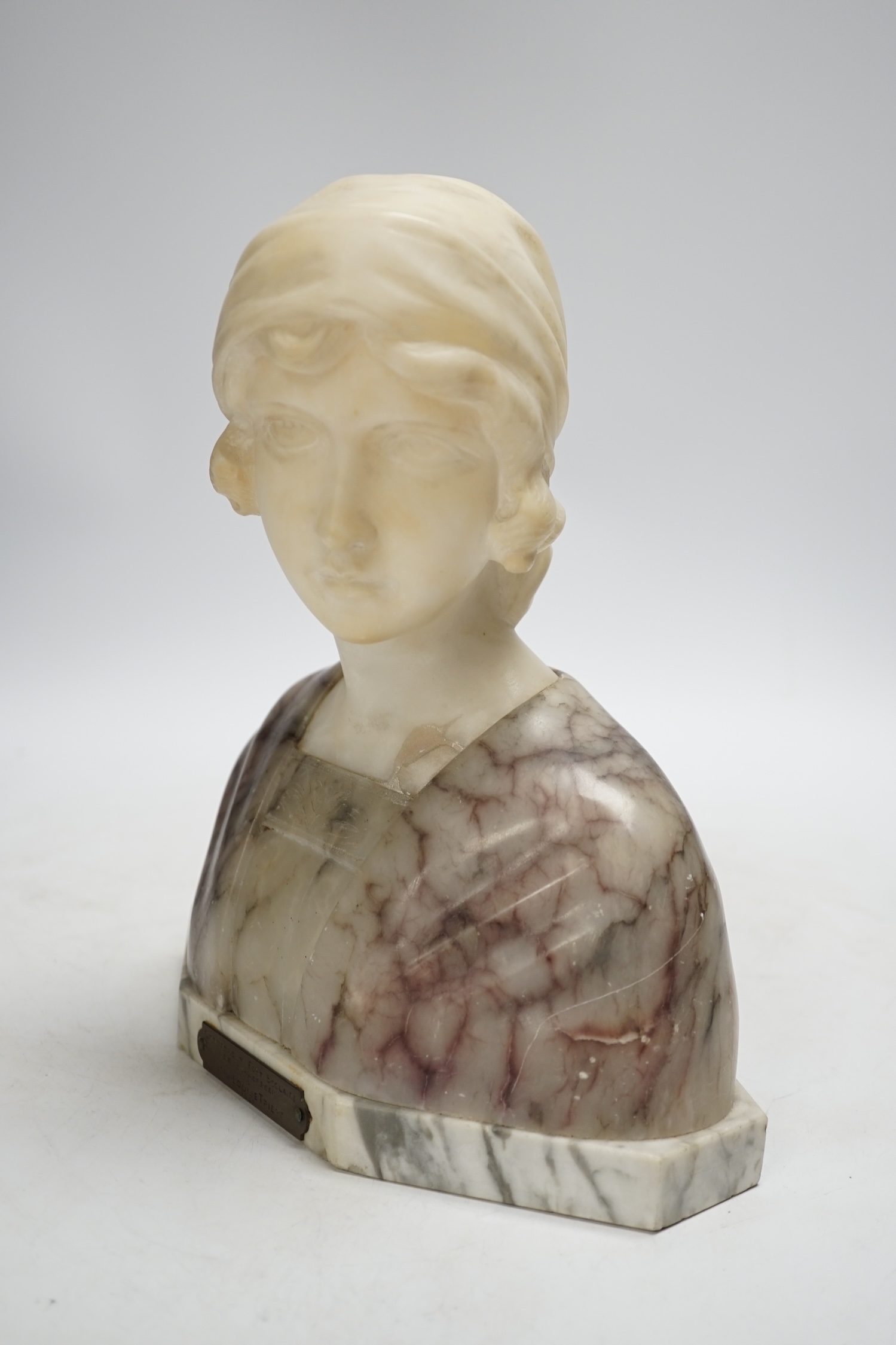 Gustave Van Vaerenbergh (1873-1927), an alabaster bust of a lady, applied plaque, signed to the reverse, 26cm high
